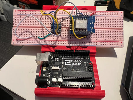 Print a Holder That Keeps Your Arduino and Breadboard From Sliding Around