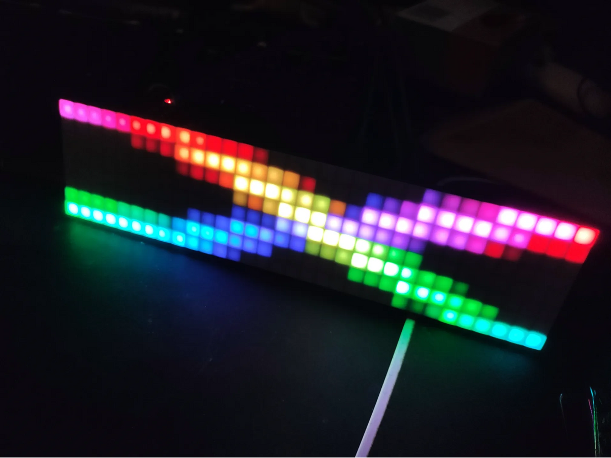 3D printed translucent diffuser fitted over an 8x8 WS2812B addressable LED matrix showing soft, evenly lit square pixels