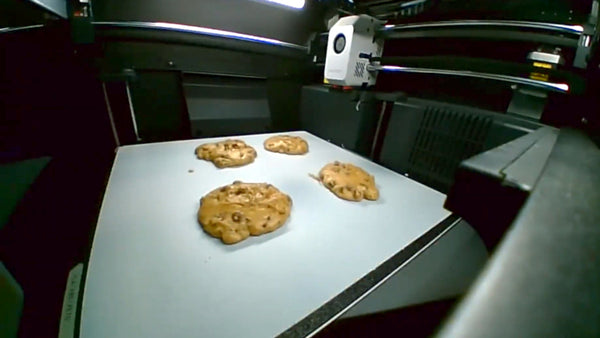 3D-printed cookie utensils arranged on a kitchen counter