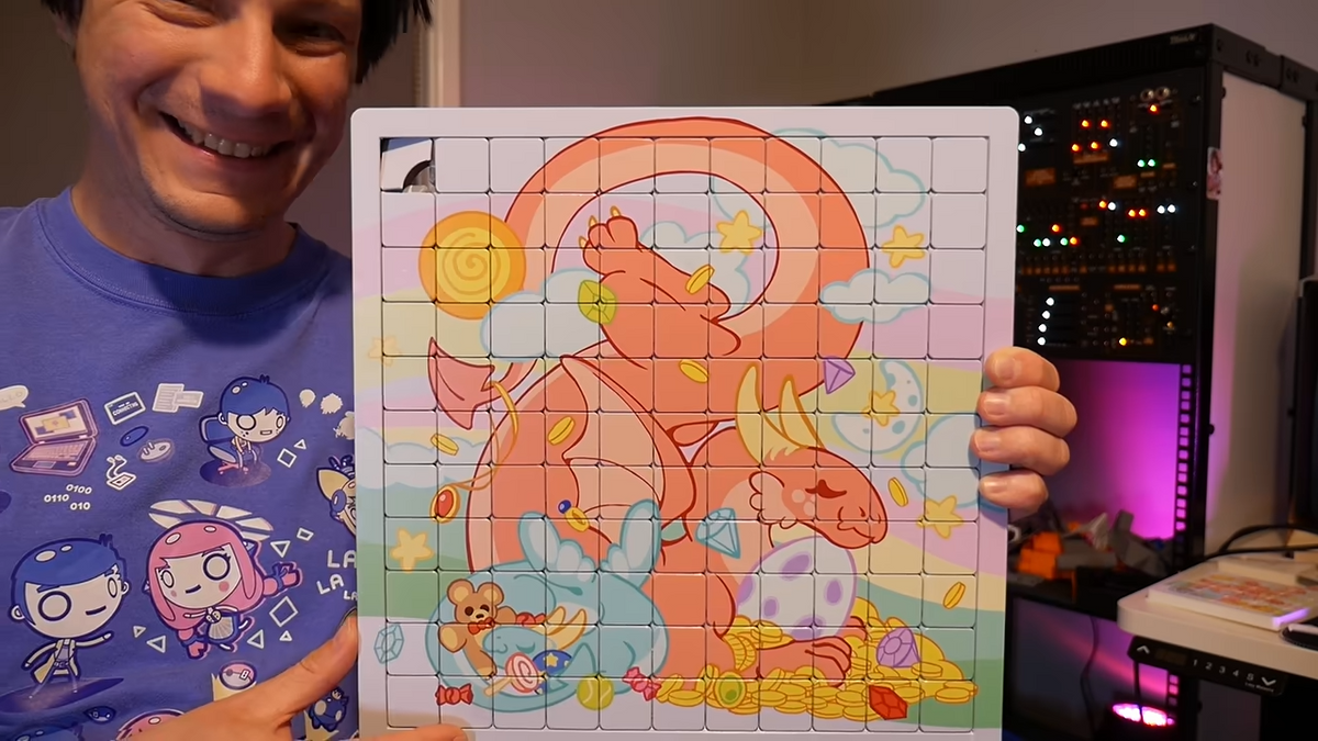 Full-colour UV-printed 3D printed sliding puzzle with print-in-place tiles, showing the clearance gaps between each sliding square