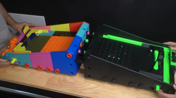 Multiplayer 3D printed pinball machine with linked playfields
