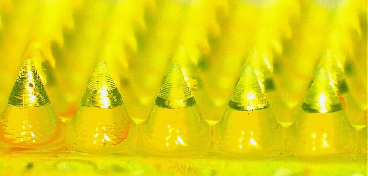 A small square 3D printed dissolvable microneedle patch developed to deliver anti-cancer drugs through the skin